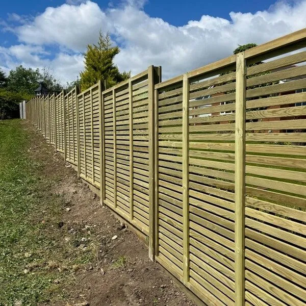 Tall wooden garden fencing