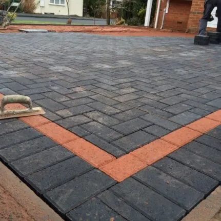 block paving driveway with red detail