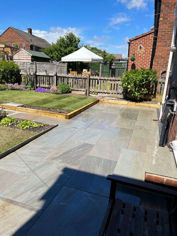 12 landscaped garden and stone patio