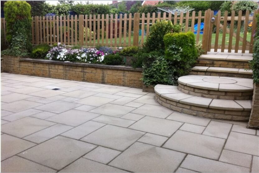42 large grey stone patio and pathway with garden fence