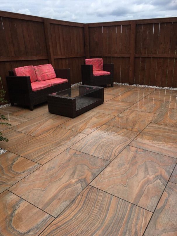 49 large sandstone slab patio with garden furniture