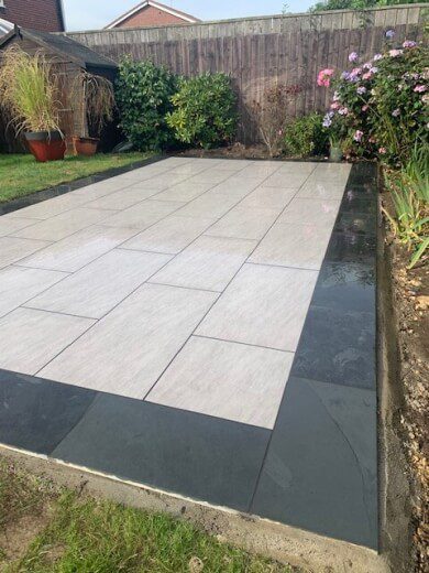 5 large grey stone slab patio, with darker large slab edging