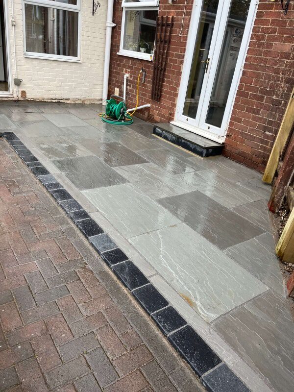 6 stone patio with block paving edging